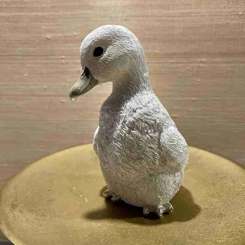Duck h.13.5cm hoog (in Geel-Groen-Wit)